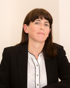 Sinead Woods sitting at a desk