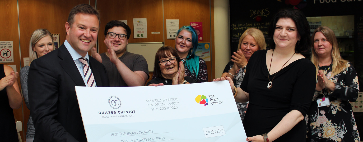 Quilter Cheviot making a corporate donation to The Brain Charity