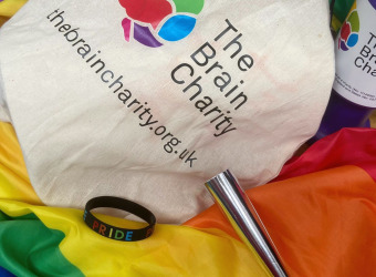 Rainbow flag on The Brain Charity's stand at Liverpool Pride 2022