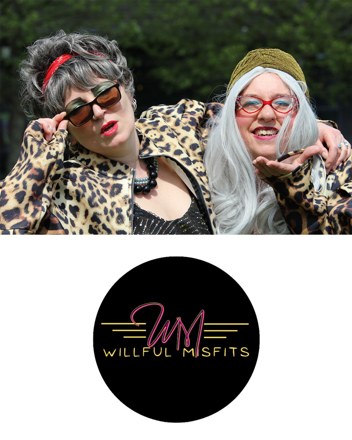 Two women in leopard skin coats, the one on the left has her arm around the one on the right. The Willful Misfits logo is beneath them