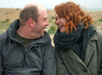 Ruby and her brother Paul smiling at each other