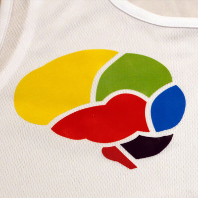 Close up of brain logo on running top