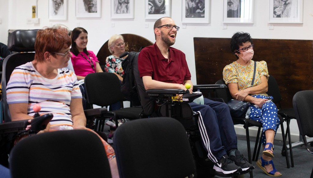 People laughing at The Brain Charity